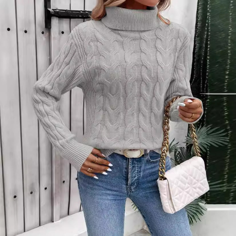 Pullover torsadé à col roulé